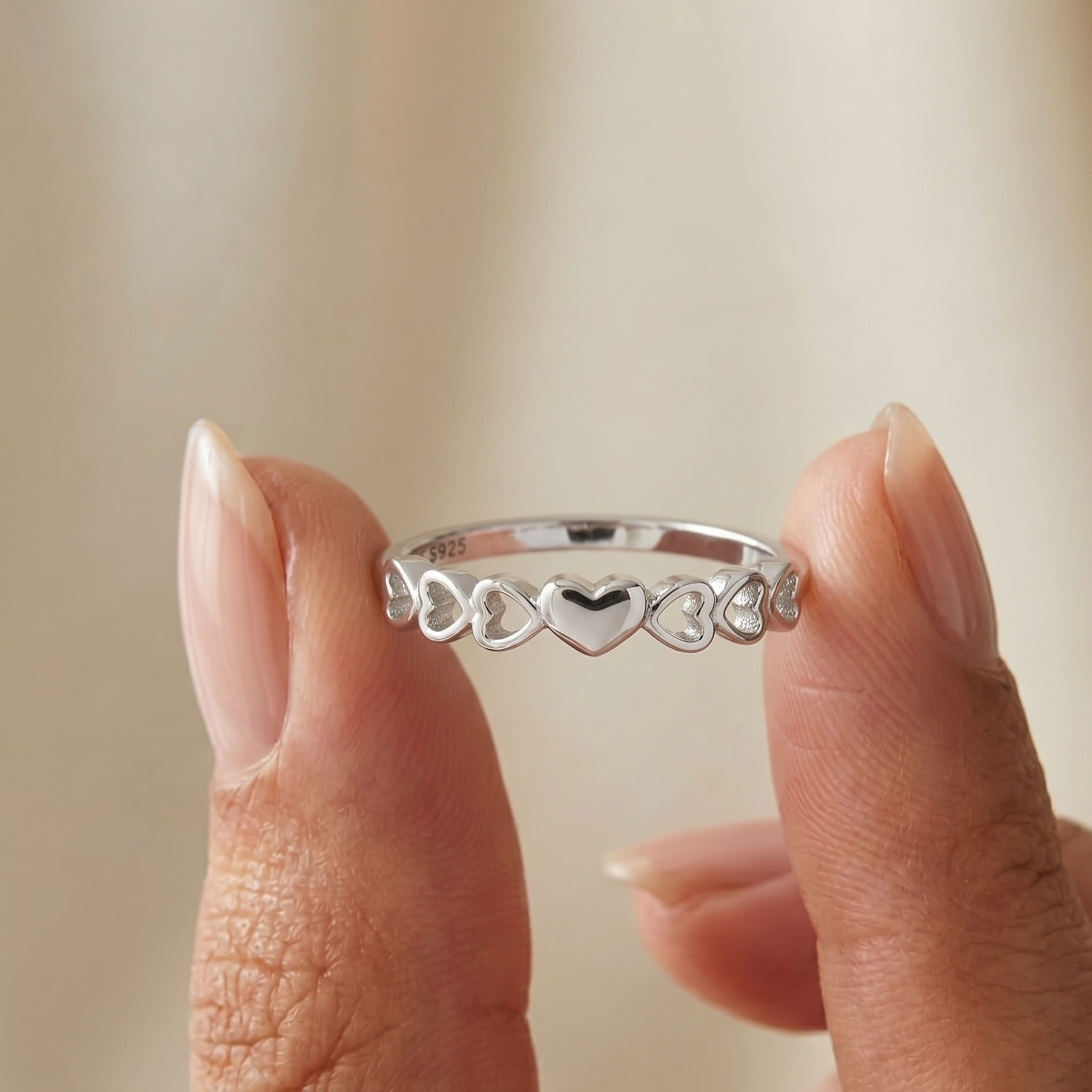 Endless Hearts Sterling Silver Heart Band