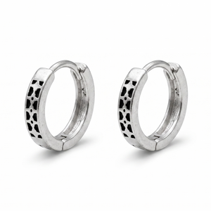 Pair of silver hoop earrings with black pattern on a white background