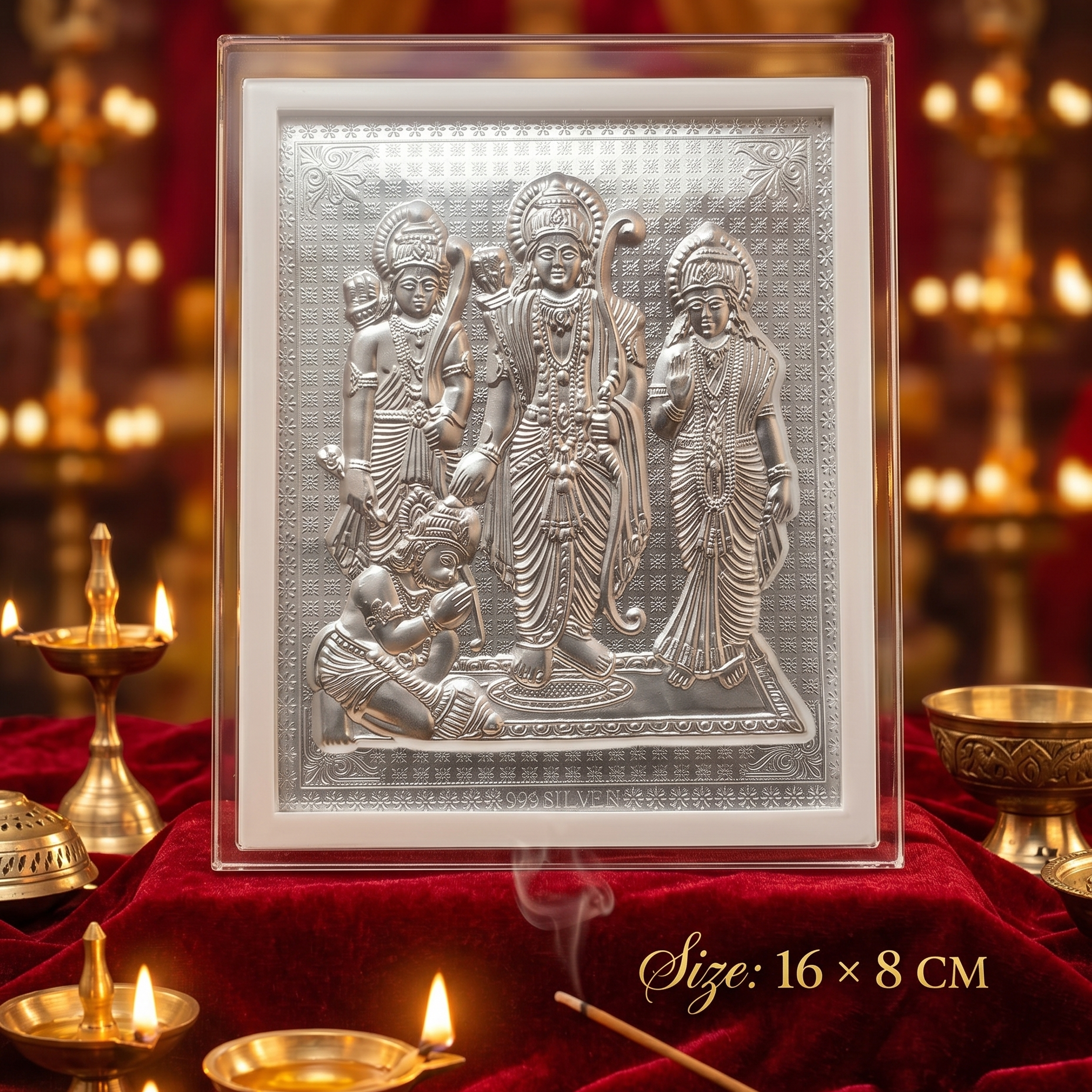 Decorative metal panel with figures on a red fabric background with candles and incense.