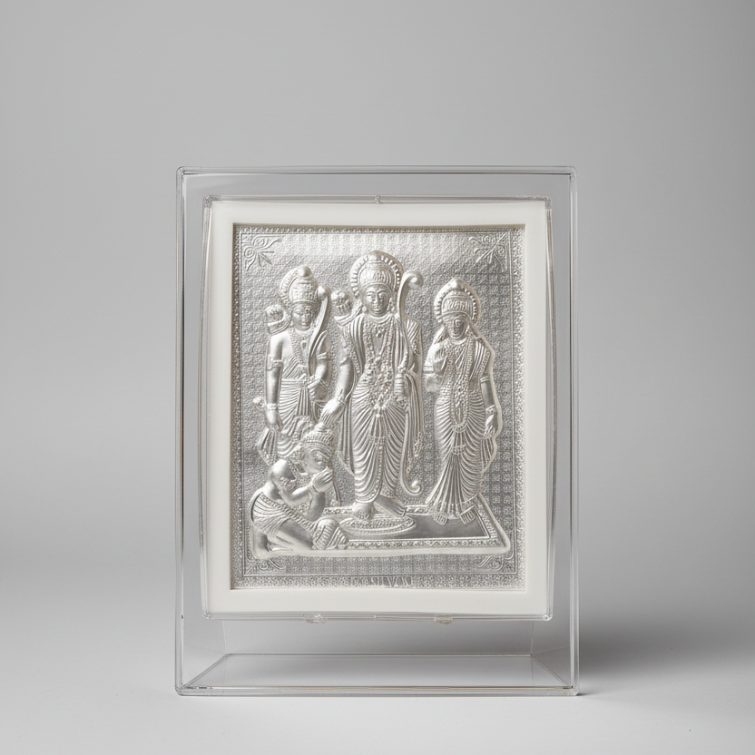 Decorative panel with three figures on a table with flowers and lights in the background