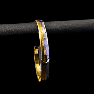 Elegant Silver Gold Kada featuring a sleek dual-tone design crafted from 925 Sterling Silver with a premium gold-plated finish, displayed against a black background.