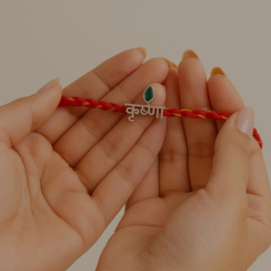 Krishna Name Silver Rakhi with Red-Yellow Thread – Lustra Exclusive