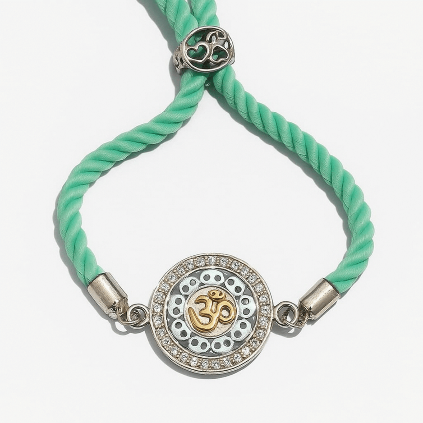 Golden Om Silver Rakhi with Mint Thread – Lustra Rakhi 2025