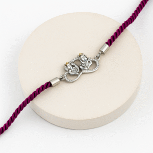 Dual Ganesha Rakhi with Studded Frame – Lustra 92.5 Silver