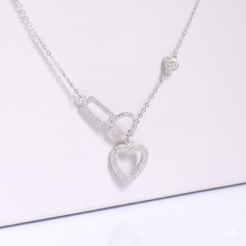 Lustra “HeartBeat” Pendant in sterling silver with crystal pavé hearts and modern shapes